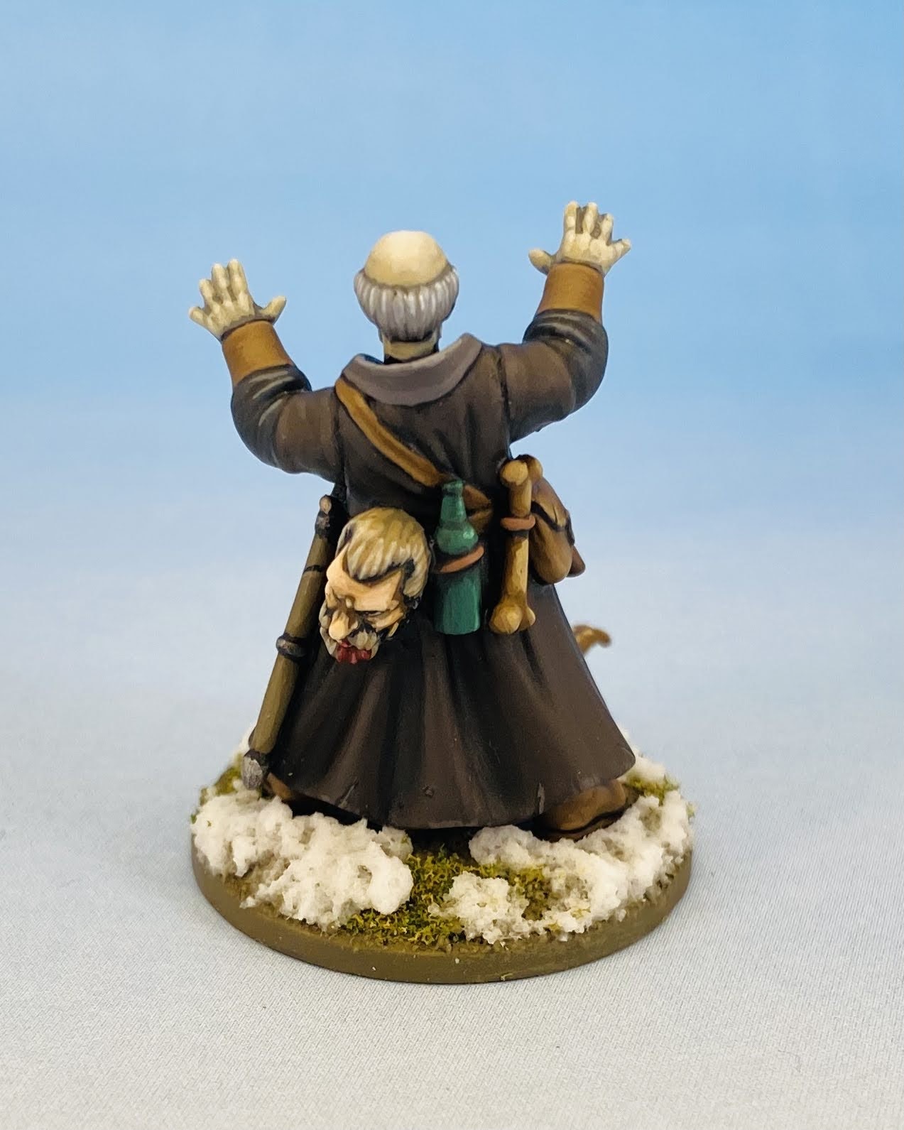 Frostgrave necromancer miniature with a severed head in his belt